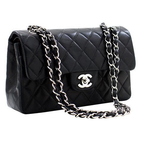 black chanel bag with red interior|Black Chanel bag with black chain.